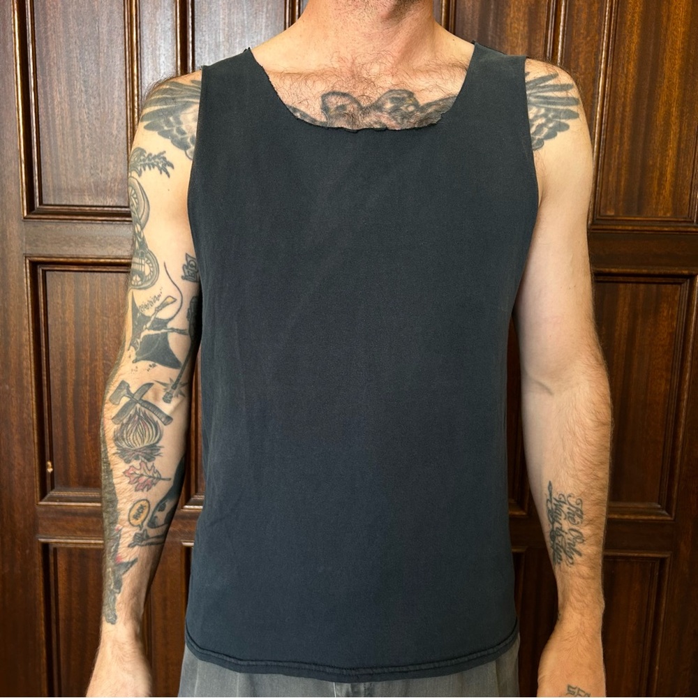 Perfectly worn in soft frayed navy cotton tank top tee